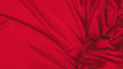 beautiful red satin fabric on white table background Top view. tailoring of elegant dresses....