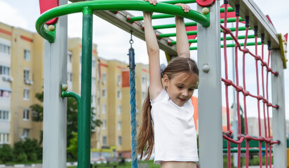 Children and healthy physical activities simple concept. Active little girl, fit sporty child...