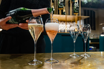 Tasting of sparkling wine champagne on winter weekend festival in December on Avenue de Champagne,...