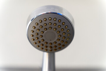 Bathroom of apartment building with close-up of shower head at Swiss City of Zürich. Photo taken December 29th, 2023, Zurich, Switzerland.