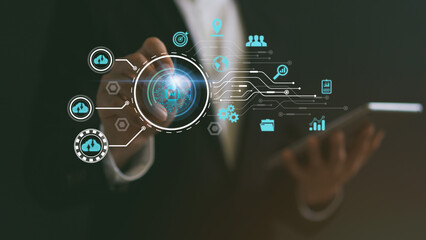 Businessman using stylus on hologram. AI analyze and visualize complex information on a virtual screen using AI to process data. Big data technology, Data flow, Artificial intelligence.