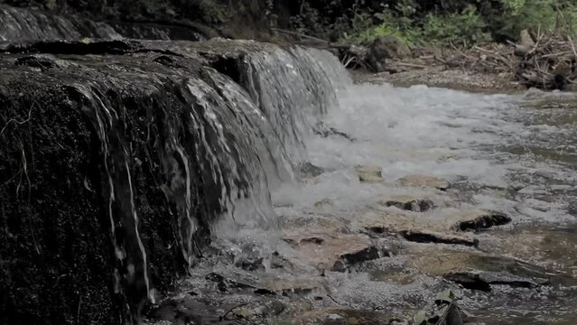 Waterfall in Banita gorge ( Cheile Banitei ), near Petrosani city, Hunedoara county, Romania