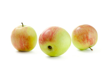 Three green apples isolated on white background with clipping path..