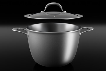 Stainless steel cooker with lid and chrome cookware on black background