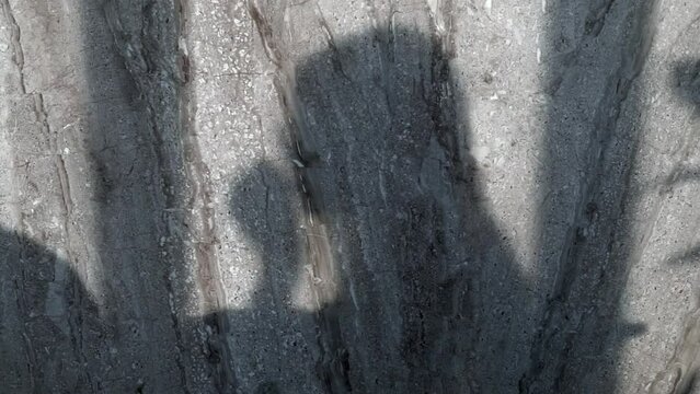 Shadow of a drinker in a cafe