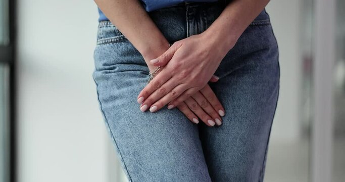 Woman hands holding intimate organs during inflammation closeup 4k movie slow motion