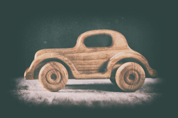 Retro car, ford. Wooden toy, vintage style. Studio shot. Decorative