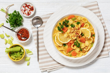 orecchiette pasta chickpea soup in white bowl