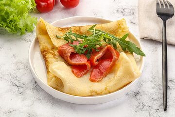 Russian pancake with salmon fish