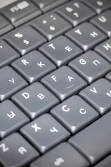Keys on a gray keyboard close up