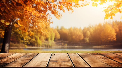 Naklejka na ściany i meble Empty wooden table with autumn background