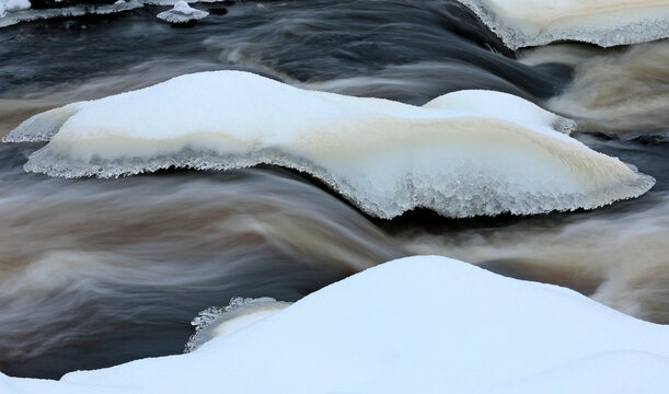 Ice on flowing river