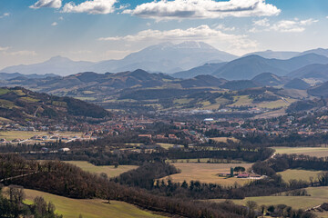 Naklejka premium Panoramic view across the Metauro valley with the town Urbania; mount Catria in the background