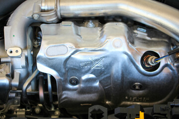 Exhaust heat shield on a new vehicle engine