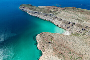 aerial sunset view of turquoise and green sea of wild mexico baja california panorama landscape