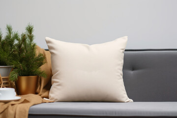 Square canvas pillow mockup on grey sofa, small cotton cushion mockup in living room interior