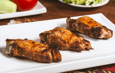 Caucasian shashlik plate with grilled meat .  pork bbq