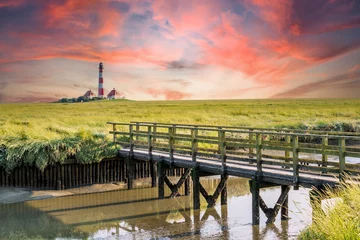 Fotobehang westerhever lighthouse in the north sea country © Animaflora PicsStock