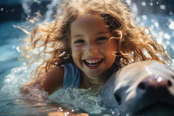 Foto op Plexiglas Adorable little girl riding dolphin. Brave kids sitting on back dolphin in swimming pool. Happy children with cute dolphin swimming in water © Irina Mikhailichenko