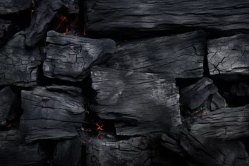 Papier Peint photo Lavable Texture du bois de chauffage Charred wood texture Scorched black surface from fire Solid material derived from burning
