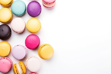 Fototapeta na wymiar Multicolored macarons on white background from above
