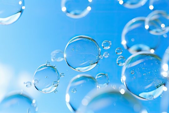 Soap bubbles in water on a blue background