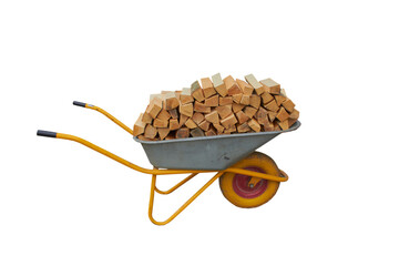 wheelbarrow with firewood on a white background, chopped firewood lies in a wheelbarrow isolated on...