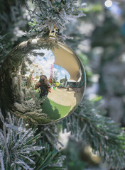 Blurry of Christmas and New Year's balls with beautiful decorations on the Christmas tree, soft light, beautiful background images and illustrations.
