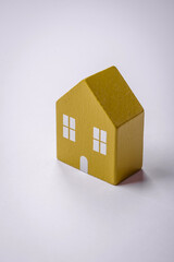 Fototapeta premium A small wooden house as an idea for investing in your own home and achieving the goal of buying real estate