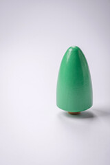 Wooden model of a tree with a green crown and trunk on a white background