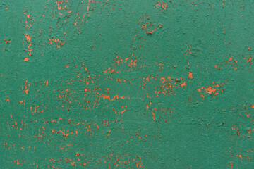Old cracked paint on fence closeup. Texture, grunge texture, old cracked paint on fence close-up