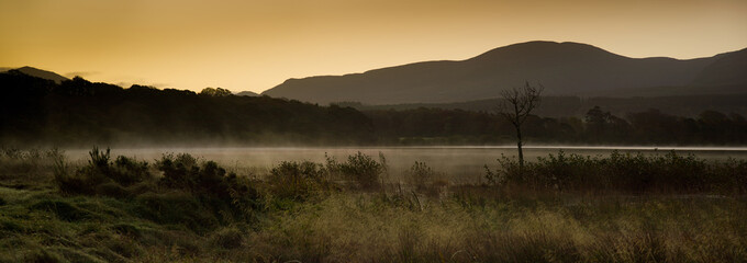 Laugh Leane Killarney, Ireland. Early in the morning, sunrise, dawn. Fog, mist or smoke on the...