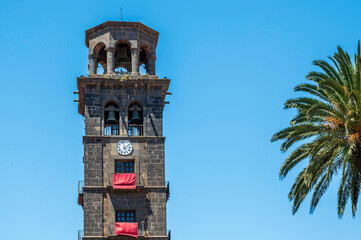 The tower of the historic church Iglesia de la Concepción in San Cristóbal de La Laguna on...