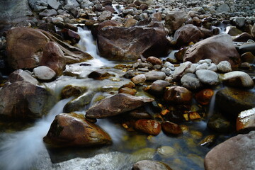 water flowing into the rocks