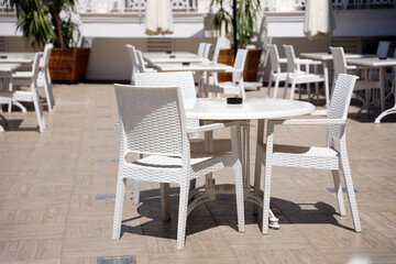 outdoor restaurant atmosphere, dining table in luxury restaurant at sunny weather - obrazy, fototapety, plakaty