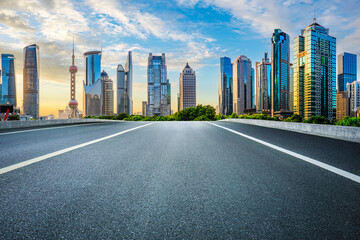 Empty asphalt and city buildings skyline in Shanghai