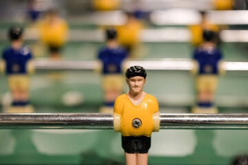 Old board game soccer. Tabletop game. Table football player. Shallow depth of field.