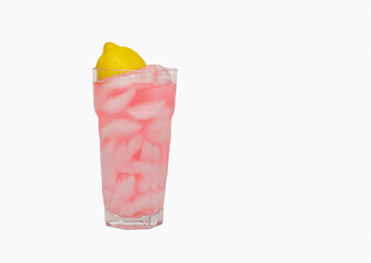 Delicious refreshing Fresh Squeezed Pink Lemonade with ice and a lemon half in a clear glass isolated on a white background with copy space.