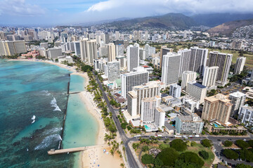 Overhead top view of man made Waikiki Beach in Honolulu, HI, showing it's wall wave barrier - obrazy, fototapety, plakaty