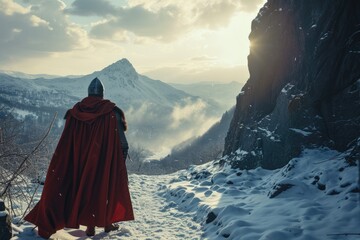 Medieval knight in a snowy landscape, red cape billowing, looking towards a distant mountain. - obrazy, fototapety, plakaty