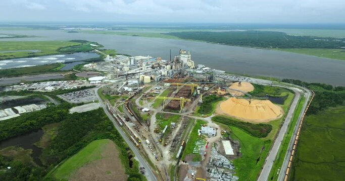 Brunswick cellulose and paper plant in Georgia, USA. Wood processing factory manufacturing yard. Toxic influence of modern industry on environment