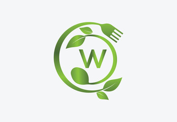 Nature and latter W with frok and spoon and healthy food