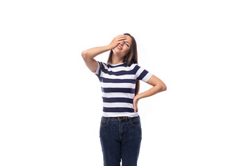 smiling slim young brunette woman with straight hair dressed in a striped t-shirt