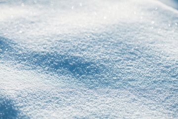 natural winter background, fresh fluffy snow, sun glare
