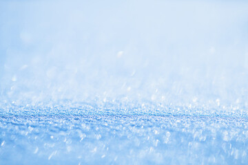natural winter background, fresh fluffy snow, sun glare