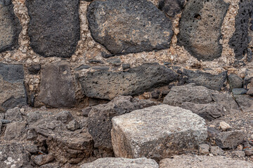 abstract background of an ancient stone wall close up