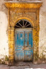Fototapeta na wymiar Old ornate blue door in the medina of Essaouira, Morocco, North Africa
