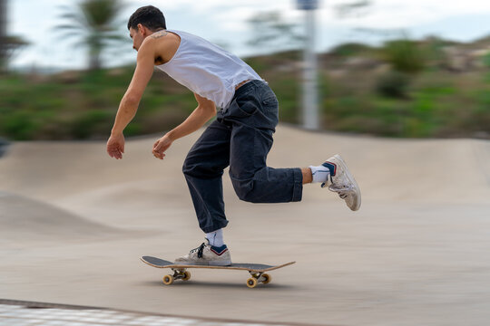 young man skating in a skate park