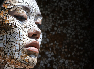 Fashion surreal Concept. Closeup of asian woman high fashion of white dirty mosaic tile texture cracked stain skin. illuminated with dynamic composition and dramatic lighting. copy text space