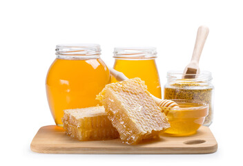 Honey with wooden honey dipper on white